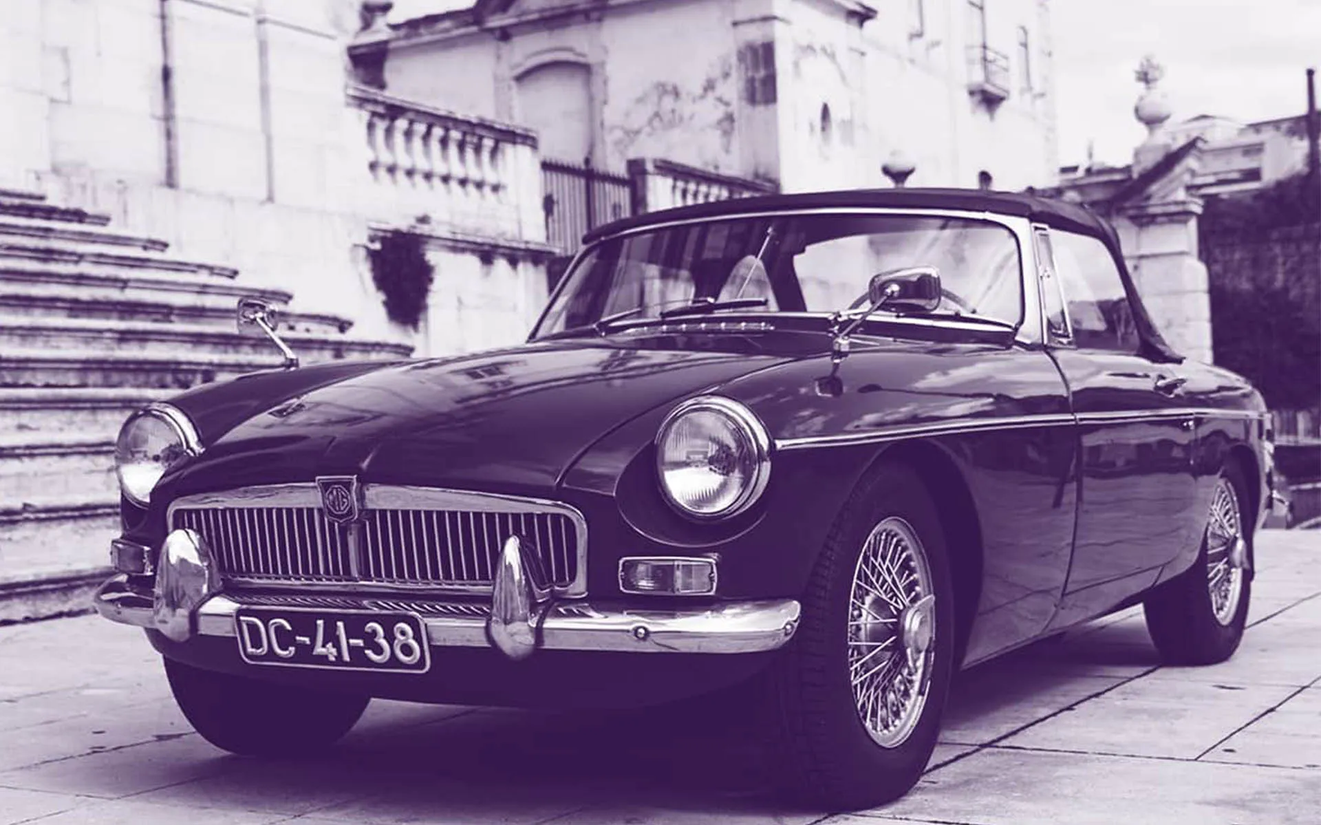 Black and white photo of a classic car, in the MyCarMatch photography style