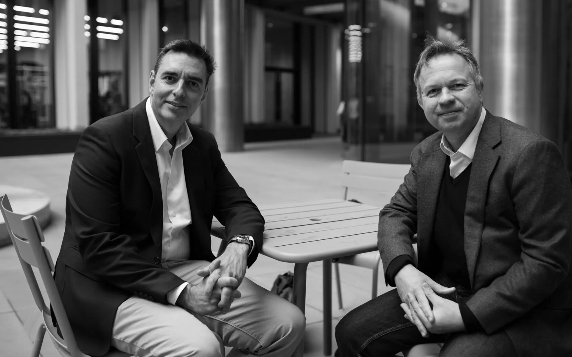 Lustrum Partners founders Joel and Adrian, seated outside in the City of London