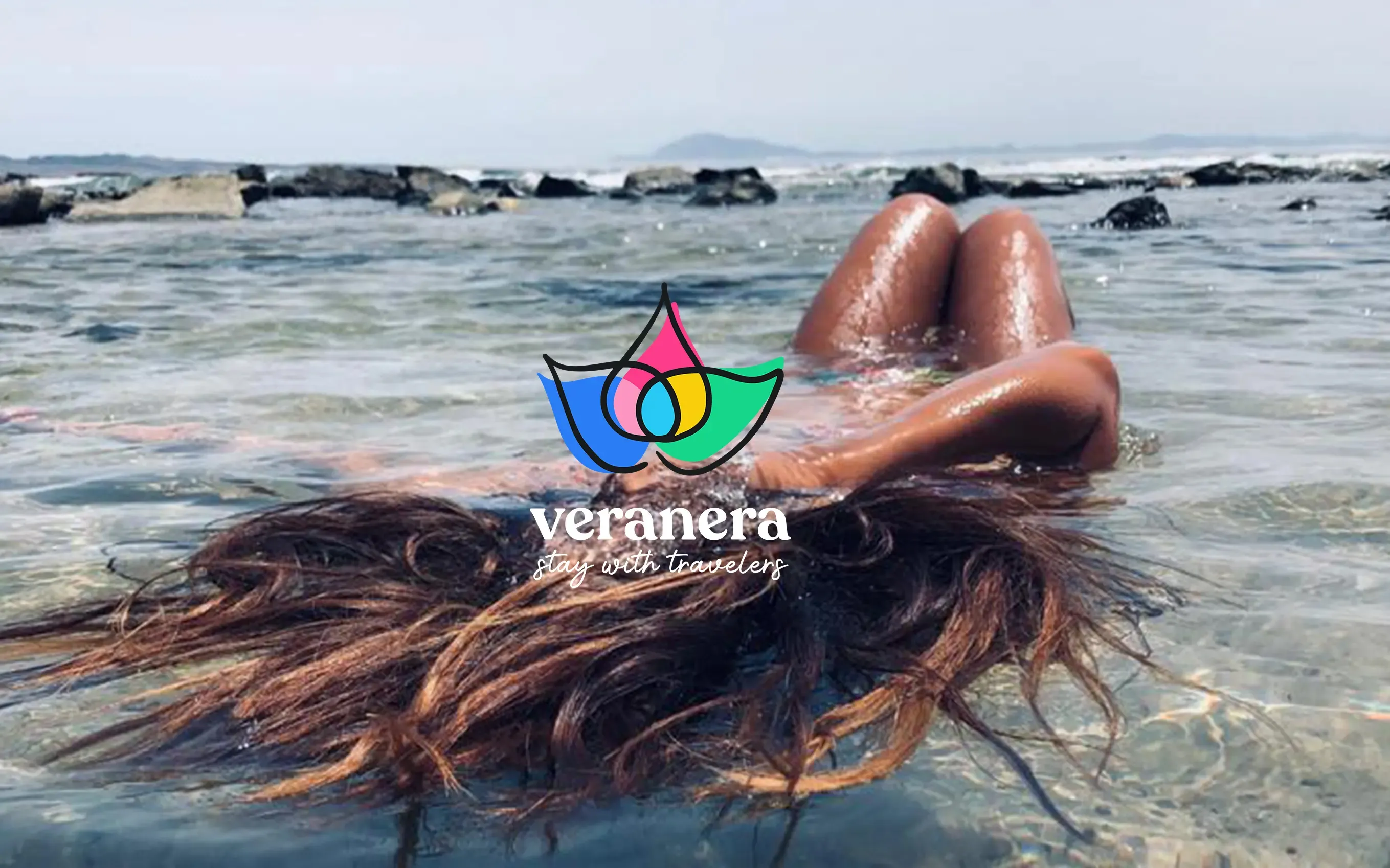 The Veranera logo over a photo of the sea