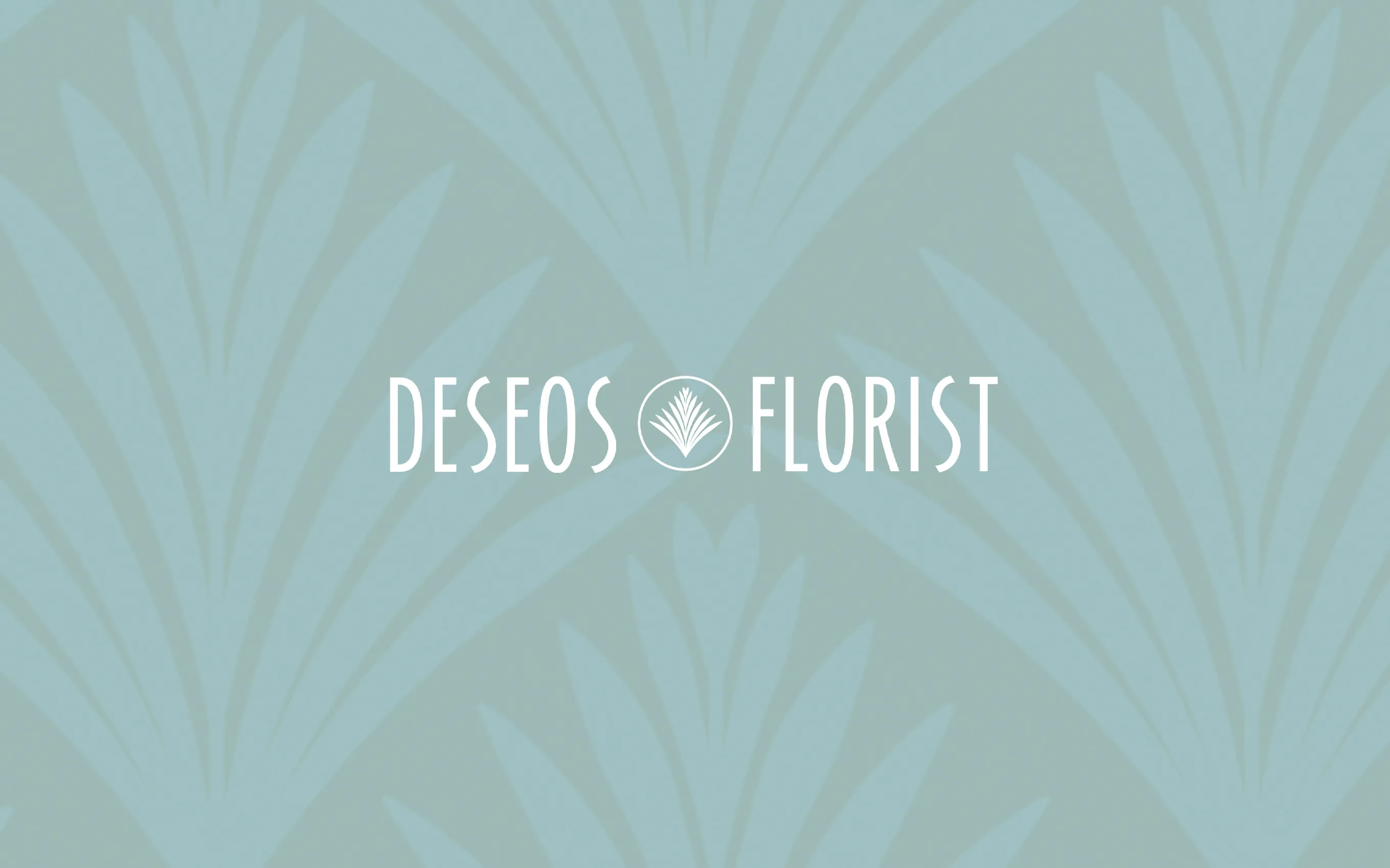 The Deseos Florist logo on its soft green leaf pattern