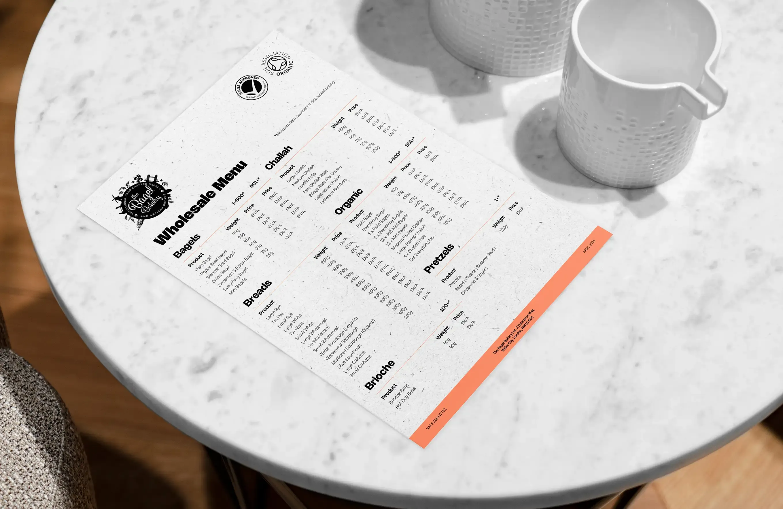 Printed price list on a café table