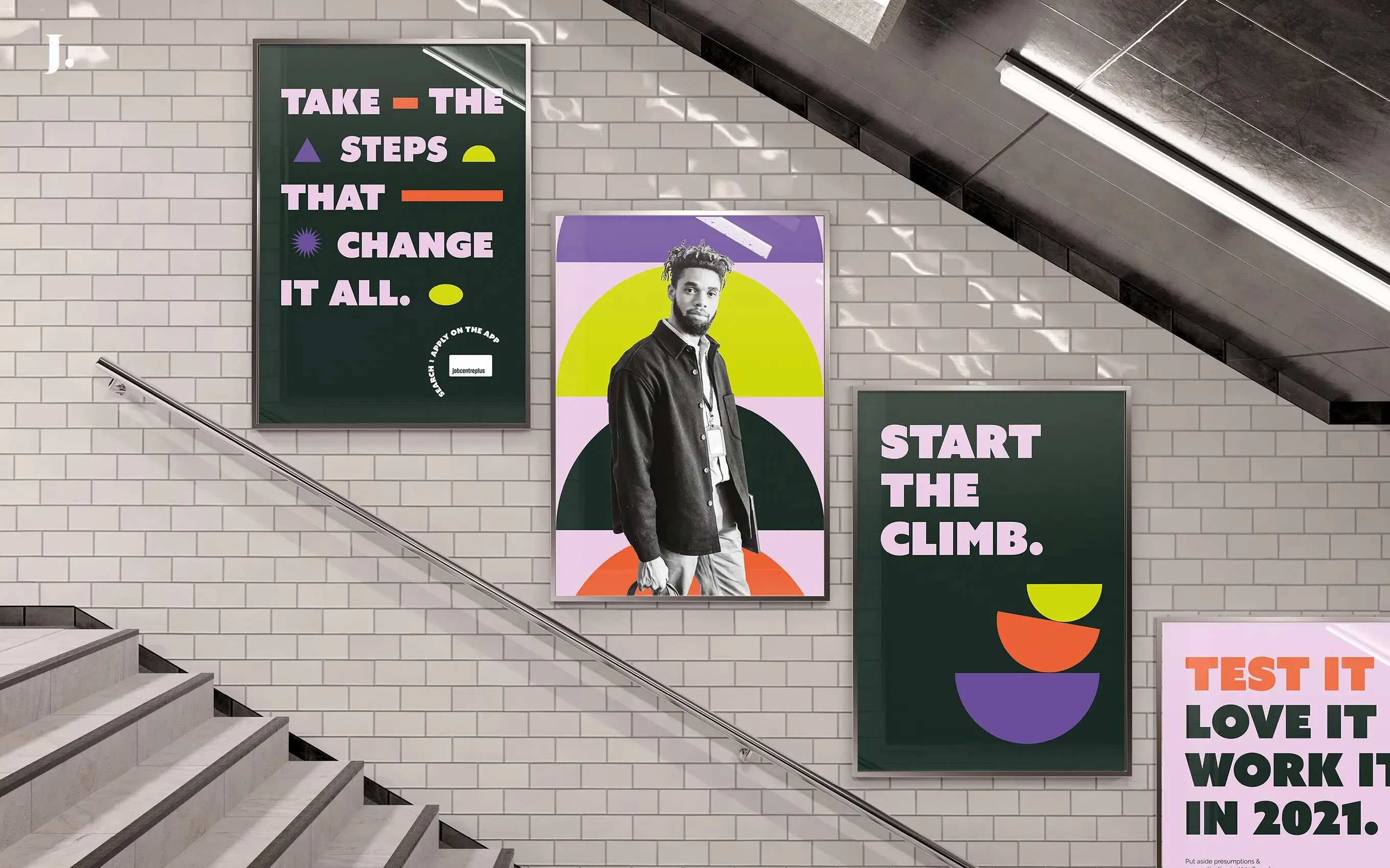 Trial Days campaign posters on an underground station escalator
